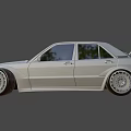 Silver Retro Modified Car With Sporty Front Design Large Alloy Wheels And Classic Sedan Style