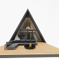 Modern Detached House With Triangular Roof Large Glass Windows And Wooden Deck Sofa Fire Pit