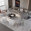 Modern Living Room Sofa And Coffee Table With Plush Pillows Textured Rug Accent Chair Artwork