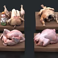 Various raw and cooked chicken pieces arranged on wooden display trays