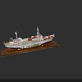 Detailed Warship Model With White Red Hull On Wooden Display Base