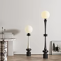 Two Tall and Short Floor Lamps With Spherical Shades Black and White Poles in Modern Interior