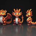 Three Cute Orange Baby Dragons Flying Animal Toys With Wings Displayed