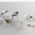 Modern Dining Table And Chair Set With Round Top Colored Seats And Potted Plants