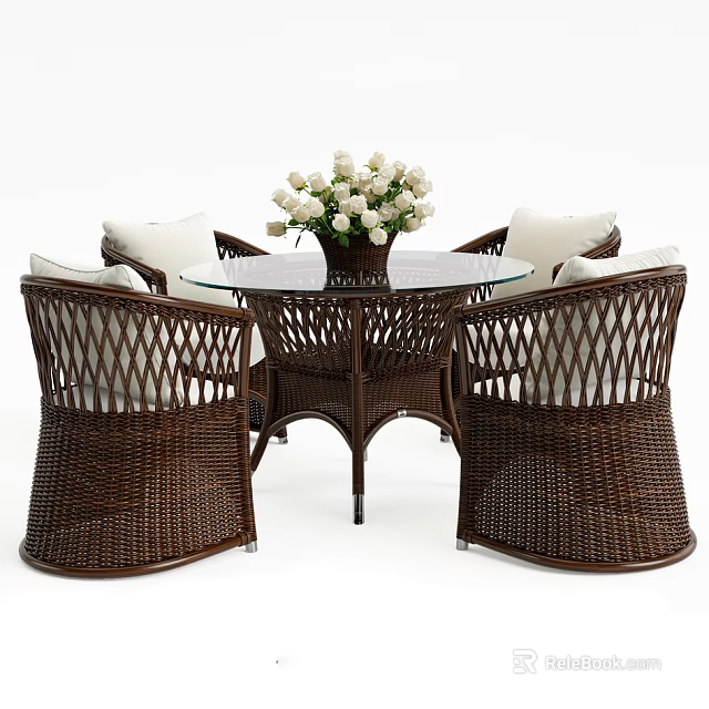 Wicker Round Outdoor Table With Matching Chairs White Cushions And Vase With White Flowers 3d model 