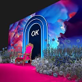 Floral Decorations Around Blue Archway With Pink Chair And Colorful Cloud Background