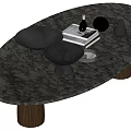 Oval Grey Marble Coffee Table With Wooden Legs Black Bowls Books And Decorative Pieces