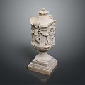 Ornate Carved Stone Vase With Detailed Relief Decorations And Sturdy Square Base