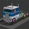 Vintage Blue And White Heavy Duty Truck With Cab And Exhaust Pipes On Road Surface
