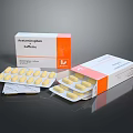 Acetaminophen Caffeine Tablets In Open Orange And White Box Packaging