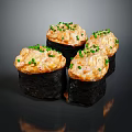 Fresh Crab Sushi Pieces With Orange Filling And Green Scallions On Black Background