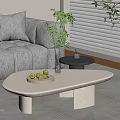 Living Room Interior With Beige Sofa White Irregular Coffee Table Fruit Plate Vase And Plants