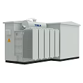 Industrial Electrical Transformer With Gray Enclosure Cooling Fins And Warning Labels