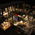 Modern Container Building Cafe Design With Outdoor Terrace Tables Chairs And Lighting
