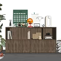 Modern Wooden Bookcase With Books Decorative Items Potted Plant Bowl Of Fruits And Cabinet Doors