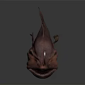Brown Anglerfish Creature Sculpture With Open Mouth Sharp Teeth And Lure On Head