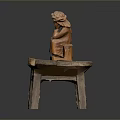 Rustic Wooden Table With Hand Carved Decorative Figure On Top