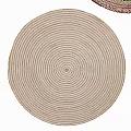 Woven Round Rugs in Neutral and Multi Colored Hues Stacked for Stylish Home Decor