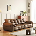 Brown Leather Double Sofa in Modern Living Room with Wooden Floor and Decorative Elements