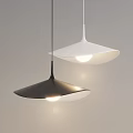 Modern Black And White Pendant Lights With Funnel Shapes Illuminated On Gray Background