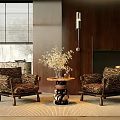 Two Patterned Accent Chairs With Wooden Legs And Small Round Table By Wooden Wall
