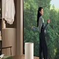 Bay Window Cabinet In Modern Interior With Lush Forest View And Cozy Chair