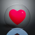 Transparent Glass Sphere With Red Heart Inside Against Dark Background And Reflection