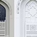 Traditional Islamic Style Arched Windows With Intricate Carved Designs And Glass Panels