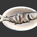 Cooked Fish with Chili Peppers and Garlic Slices on Blue White Pattern Plate in Sauce