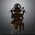 Elephant Headed Ganesh Statue With Multiple Arms Holding Items On Stone Base