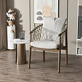 Modern Leisure Chair With Woven Armrests White Cushion And Small Round Side Table