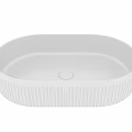 White Oval Shaped Washbasin With Vertical Ribbed Edges For Modern Bathroom Design