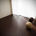 Geometric Patterned Wooden Flooring In Light And Dark Tones With Decorative Balls And Curtains
