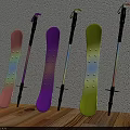 Pink Purple Yellow Snowboards And Ski Poles Leaning Against Wall On Wooden Floor