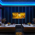 Modern KTV Interior With Blue Lighting Large Screen Sofa And Fruit Wine Glasses On Table
