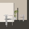 Two Modern Metal Frame Leisure Chairs With Green Plant In Light Colored Room