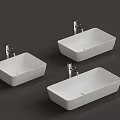 Three Modern White Ceramic Washbasins With Silver Faucets And Sleek Design 3d model