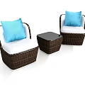 Rattan Single Sofa with White Cushions Blue Pillows and Small Black Side Table