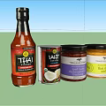 Assorted Thai Condiment Bottles and Jars Including Coconut Milk Red Curry Paste and Chili Sauce