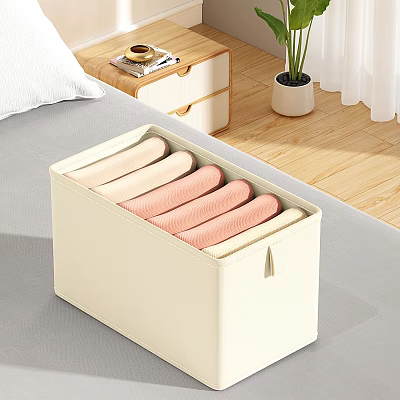 Neatly Folded Pastel Colored Clothes In Beige Storage Box For Bedroom Organizing 3d model