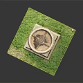 Decorative Stone Urn With Ornate Top On Square Pedestal In Green Grass