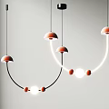 Modern Pendant Lights With Arched Black Frames Orange Shades And Glowing White Bulbs