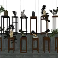 Various Stylish Plant Stands With Green Plants And Decorative Ornaments