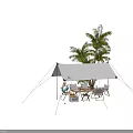 Outdoor Table Setup with White Umbrella Palms Hanging Chairs Colorful Balloons and Fruit Tableware