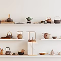 Various Tea Sets With Teapots Cups On White Shelves Light Wall Background 3d model