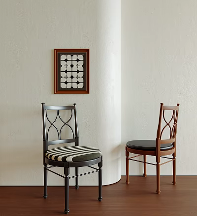 Two Stylish Dining Chairs With Black And Wooden Frames Striped And Black Cushions And Wall Art 3d model