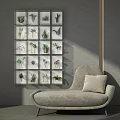 Modern Interior Wall Decor With Framed Green Plant Specimens And Gray Sofa