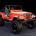 Orange Jeep Open Top Convertible With Large Off Road Tires And Gray Seats