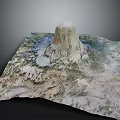 Garden Landscape Design Featuring Tall Isolated Rock Formation Surrounded by Green Grassland and Rolling Terrain