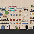 Organized Sports Equipment Arrangement on Wall Pegboard with Various Balls Rackets Dumbbells and Fitness Gear